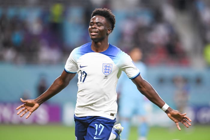 Bukayo Saka pictured celebrating after scoring the first of his two goals during England's win over Iran at the 2022 World Cup in Qatar